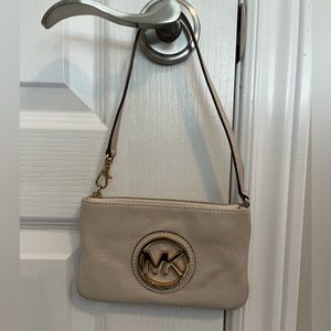 Michael Kors off white wristlet pouch